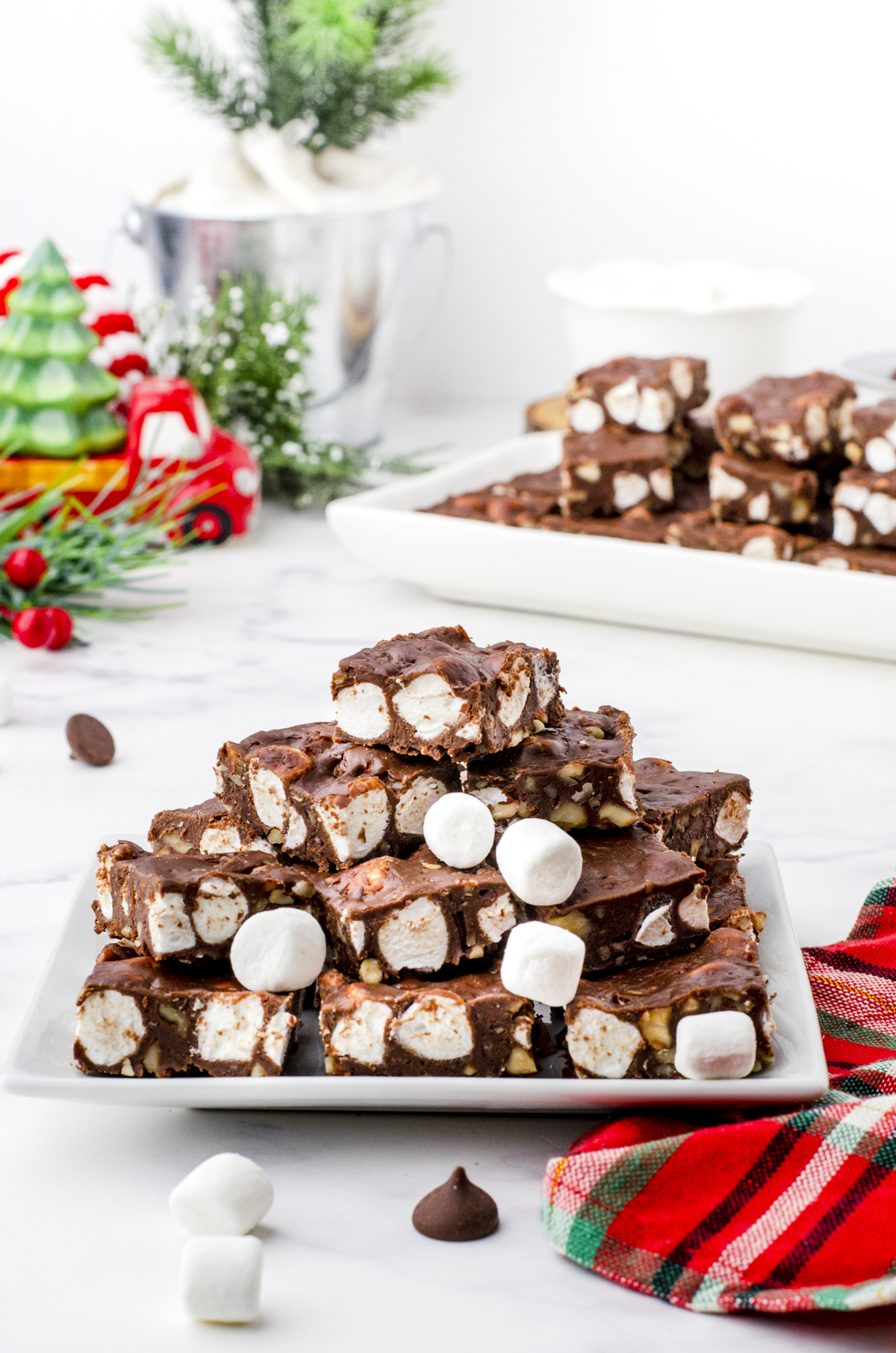 5 minute fudge with sweetened condensed milk piled on a white plate