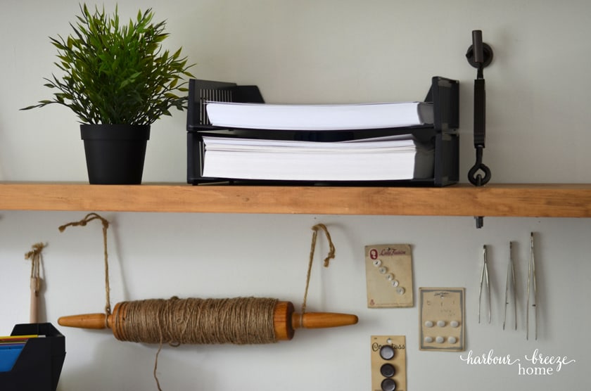 A two teir horizontal traysystem with printer paper in one tray and cardstock in the other.