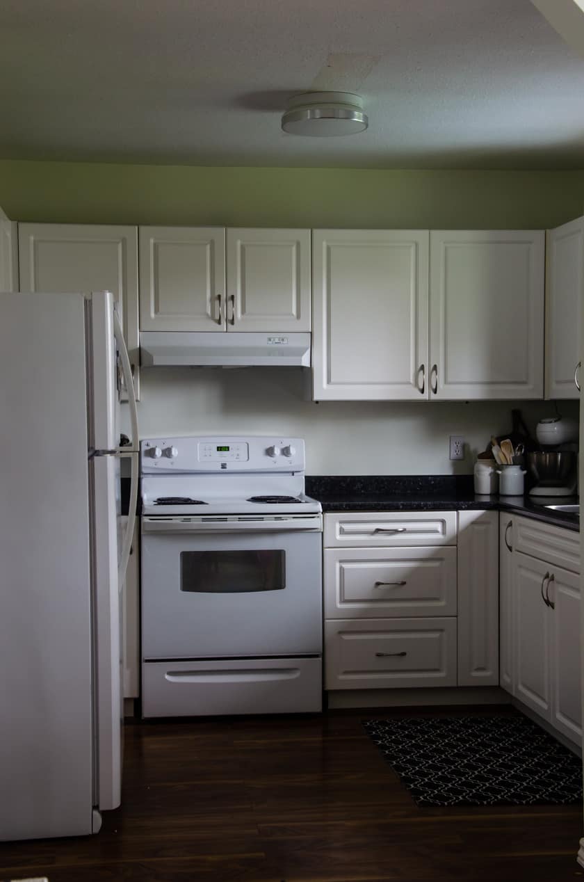 kitchen before upper cabinet lighting was installed