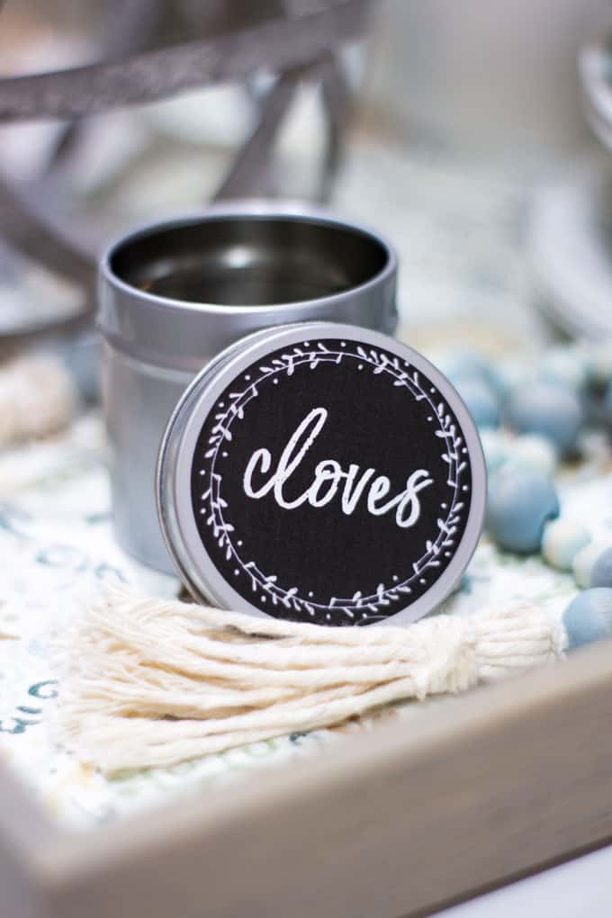 cloves spice jar on tray with tassel