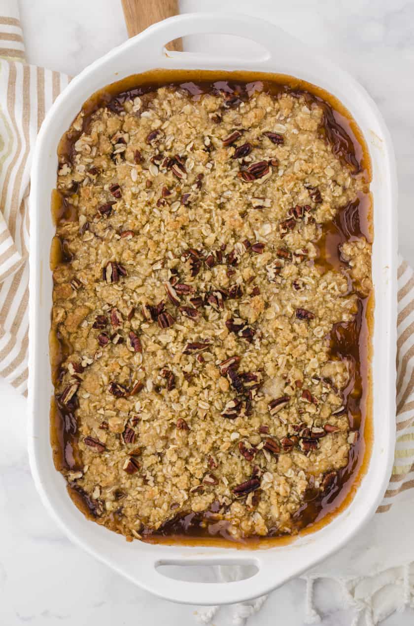 Baked apple crisp with apple pie filling in a 9x13 inch pan.