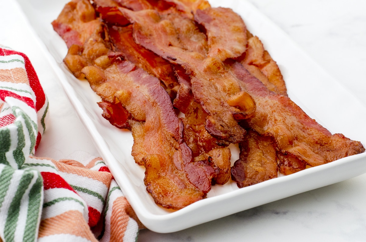 Crispy bacon on a platter ready to be served.
