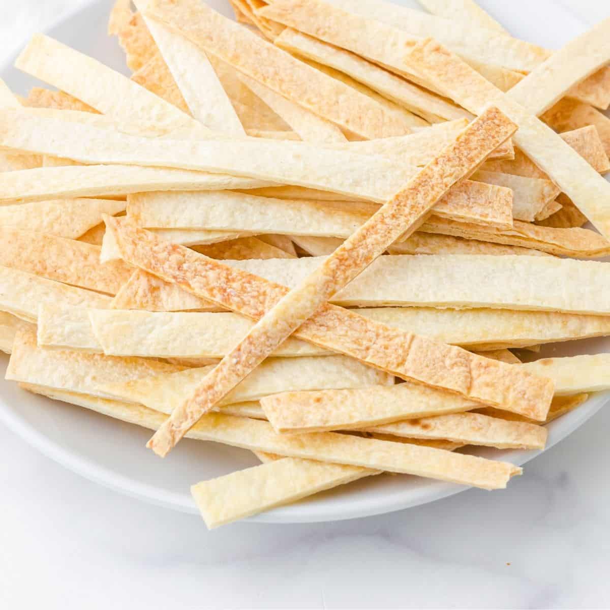 crispy tortilla strips on a plate