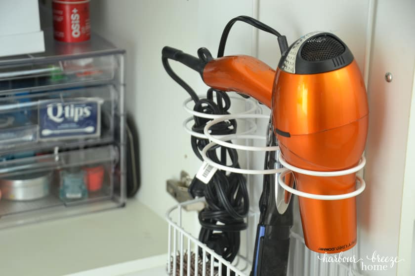 over the door organization solution for blow dryer and hair styling tools