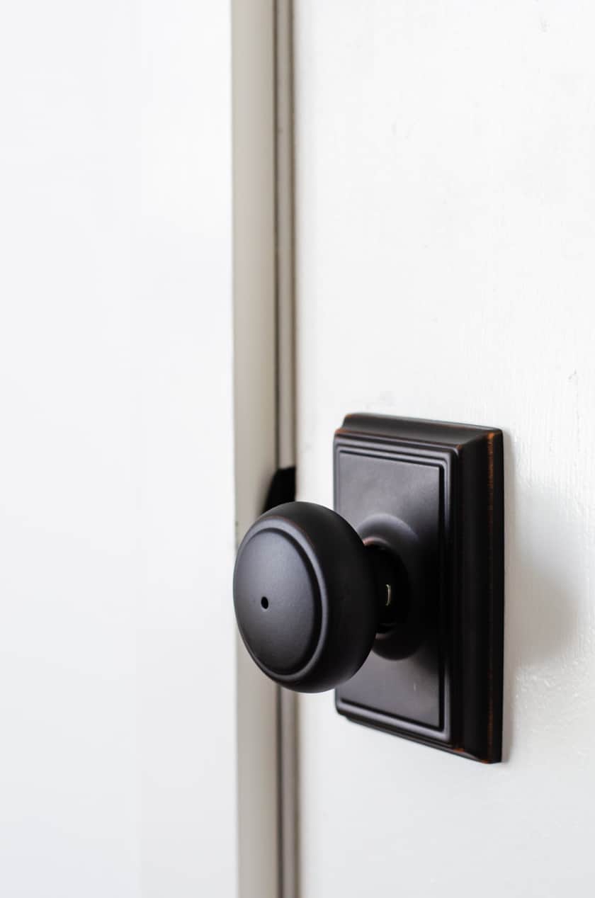 Modern Bedroom Doorknob from Schlage - black with square plate behind knob
