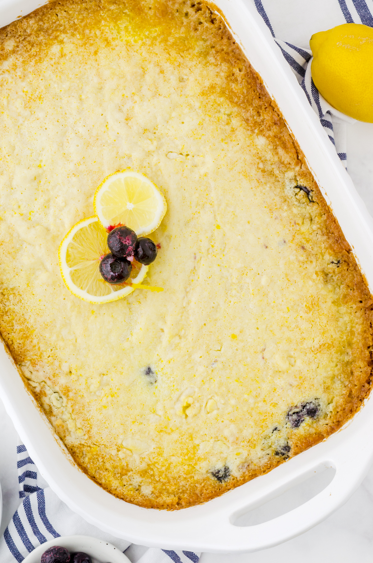A pan of baked lemon blueberry dump cake.