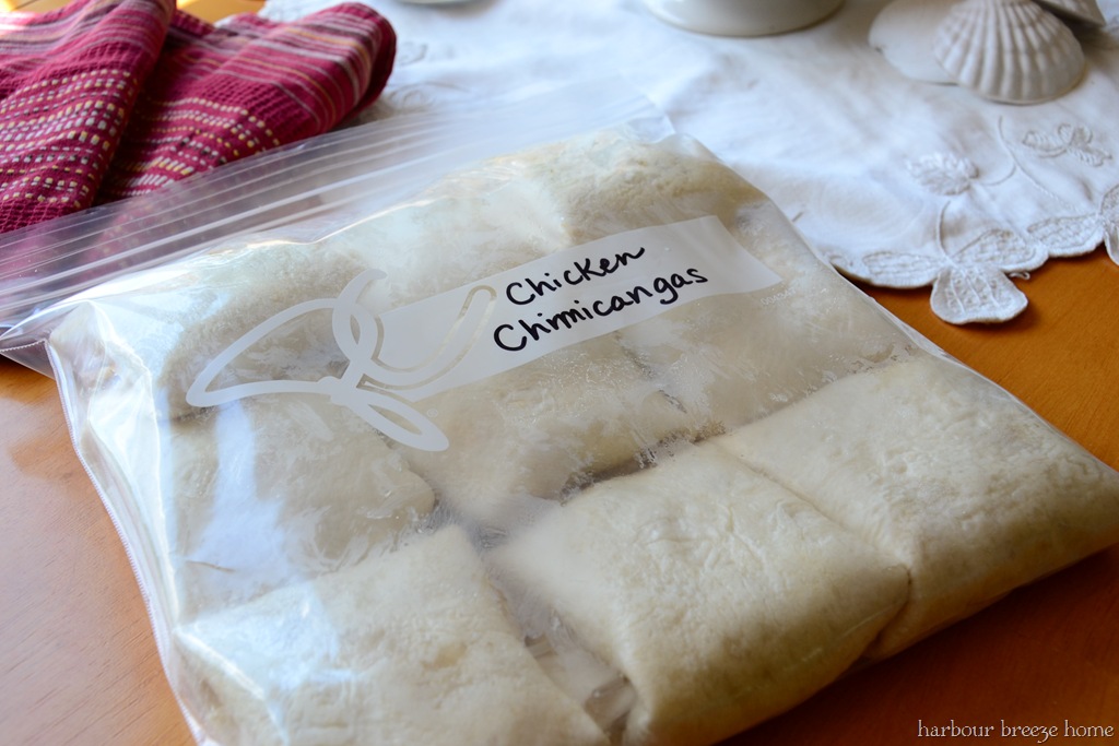 chicken chimicangas in a ziploc freezer bag ready to be frozen to use later.