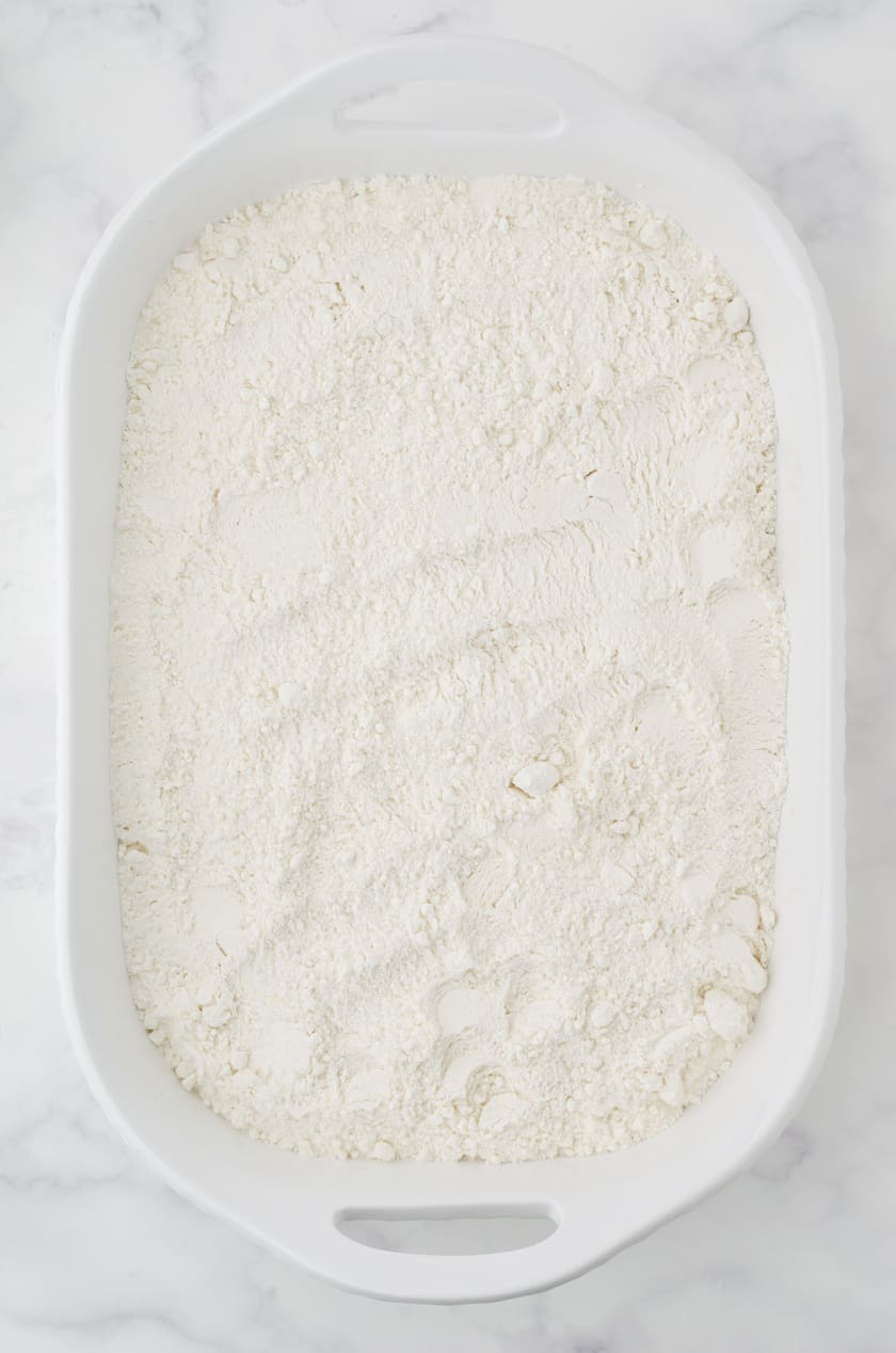 cake mix sprinkled onto cherry pie filling for cherry dump cake recipe