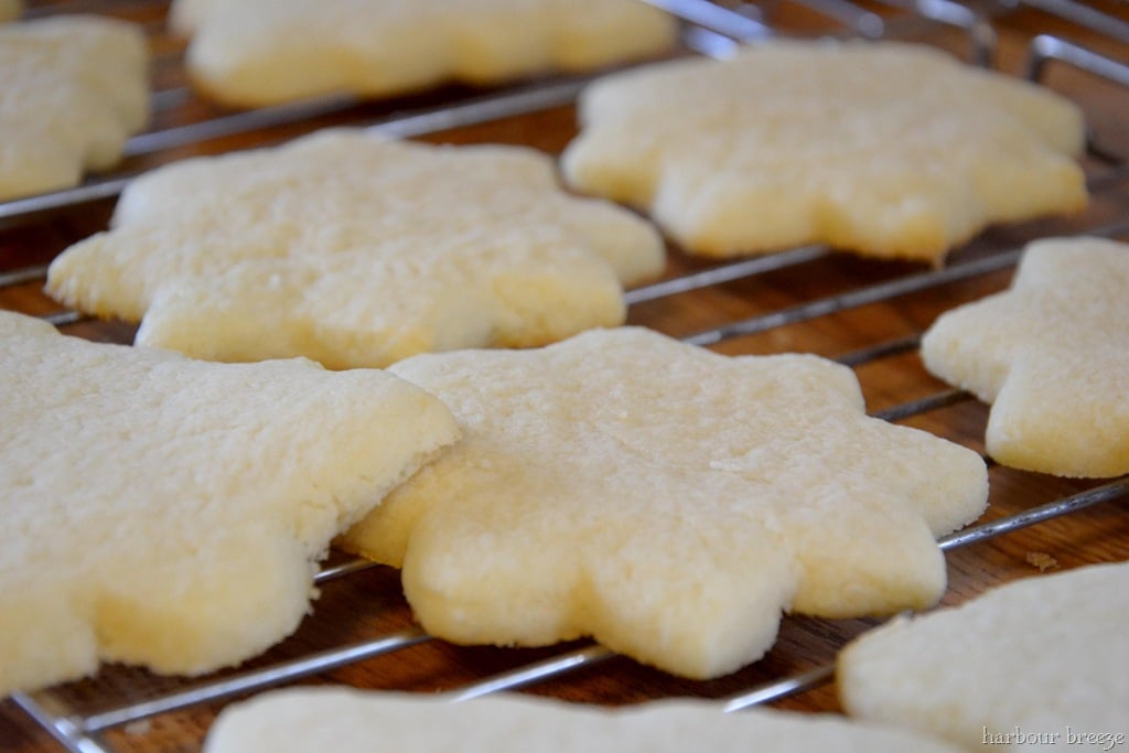 baked cut out cookies on a cooling rack
