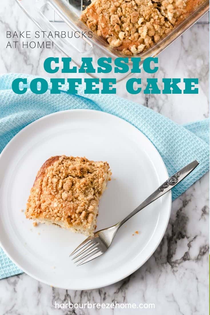 Slice of coffee cake on a white plate with a fork.