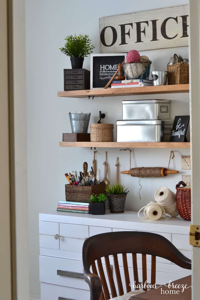 Turbuckle Wood Shelves with craft supplies arranged with farmhouse style decor and greenery