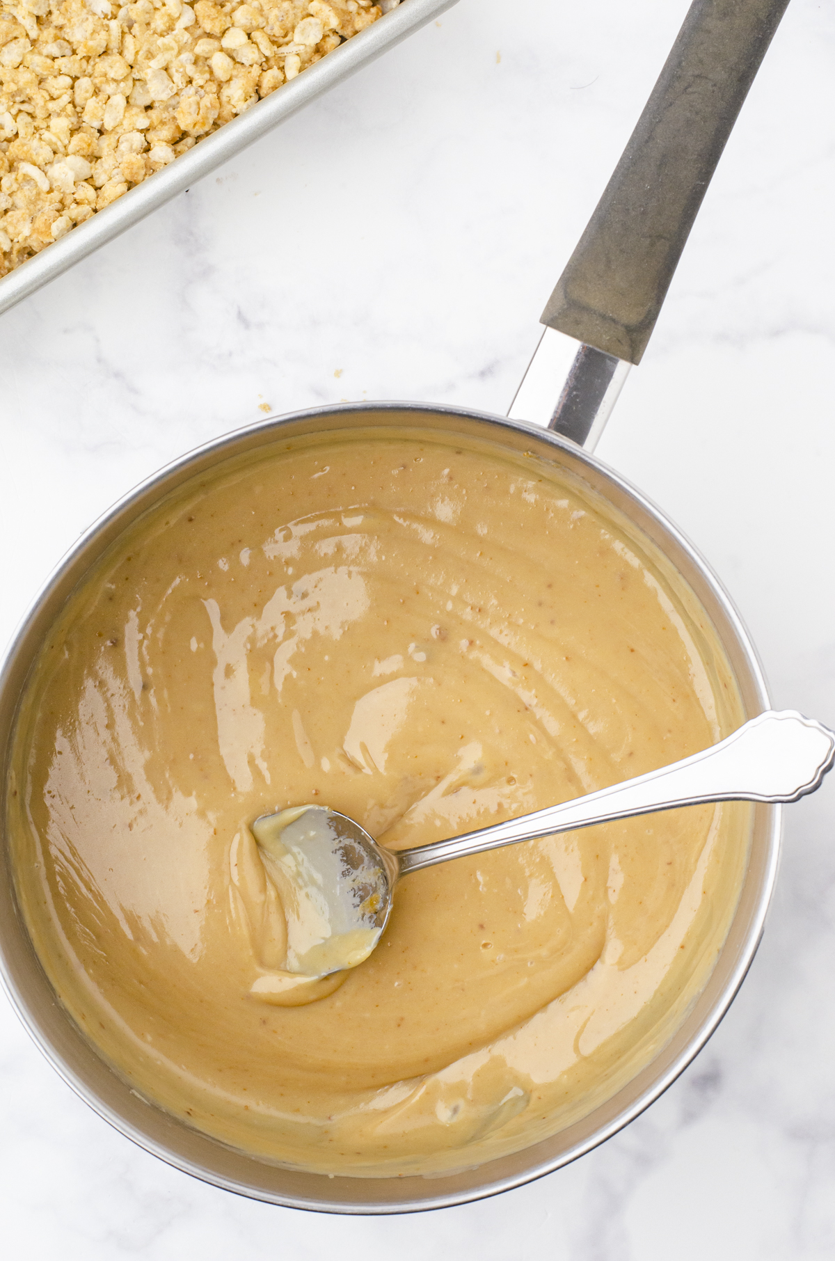 Caramel filling in a saucepan for Chocolate Caramel crispy rice bars