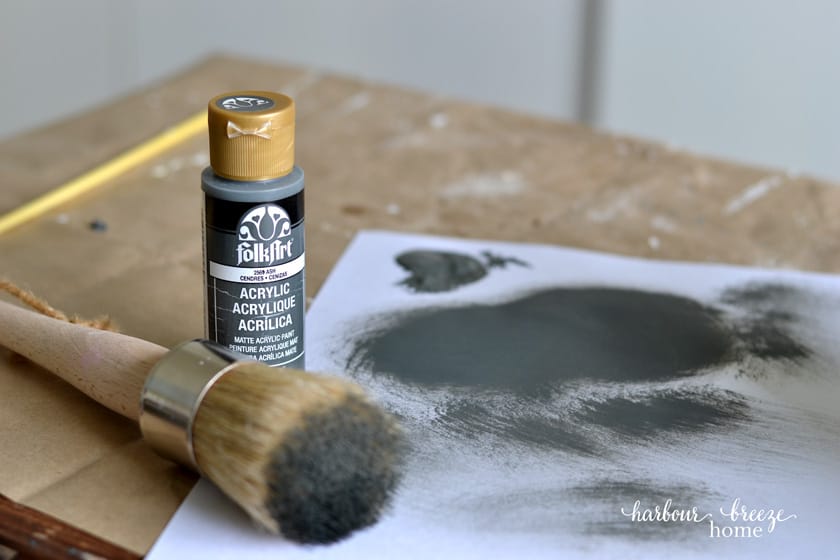 Gray paint and brush used to paint farmhouse style corbels