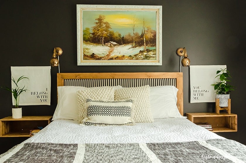 2 DIY floating bedside tables flanking a bed