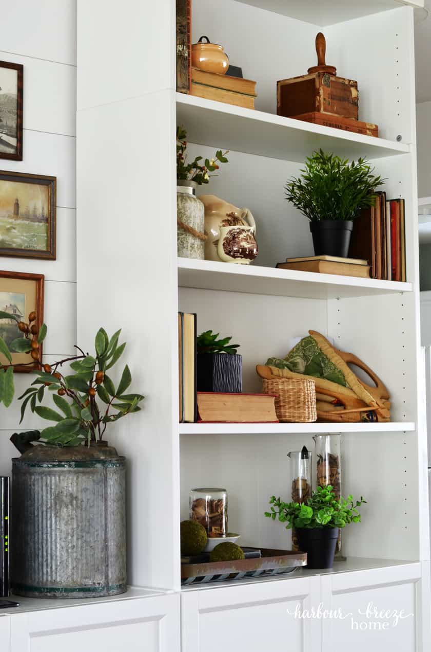 Bookcase styling with vintage decor