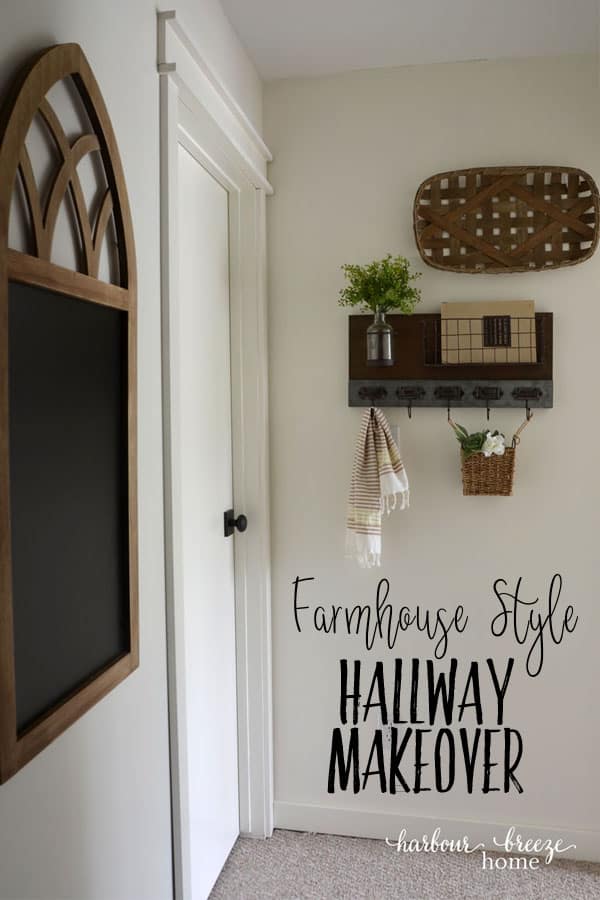 white bedroom door with oil rubbed bronze Schlage door knob and farmhouse decor on the walls around it