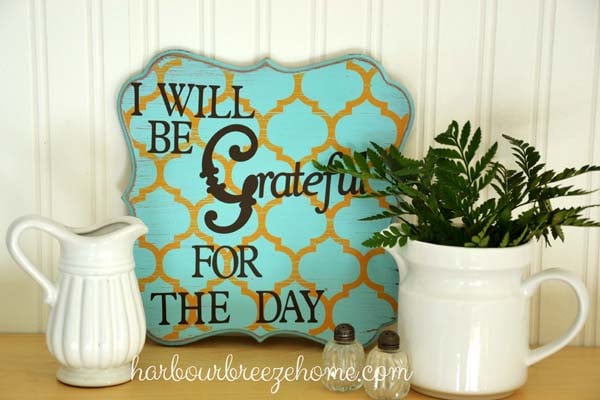 Fern leaves in a pitcher on a shelf