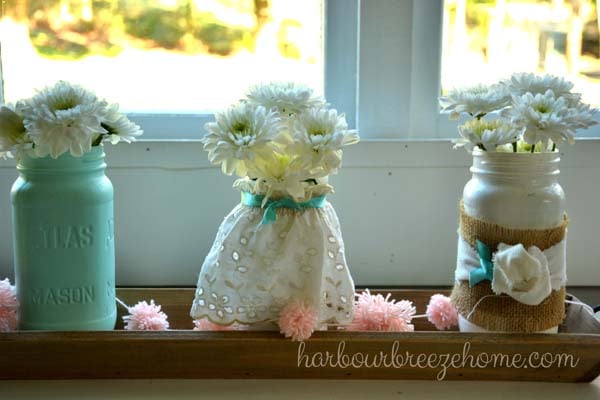 White carnations in mason jars