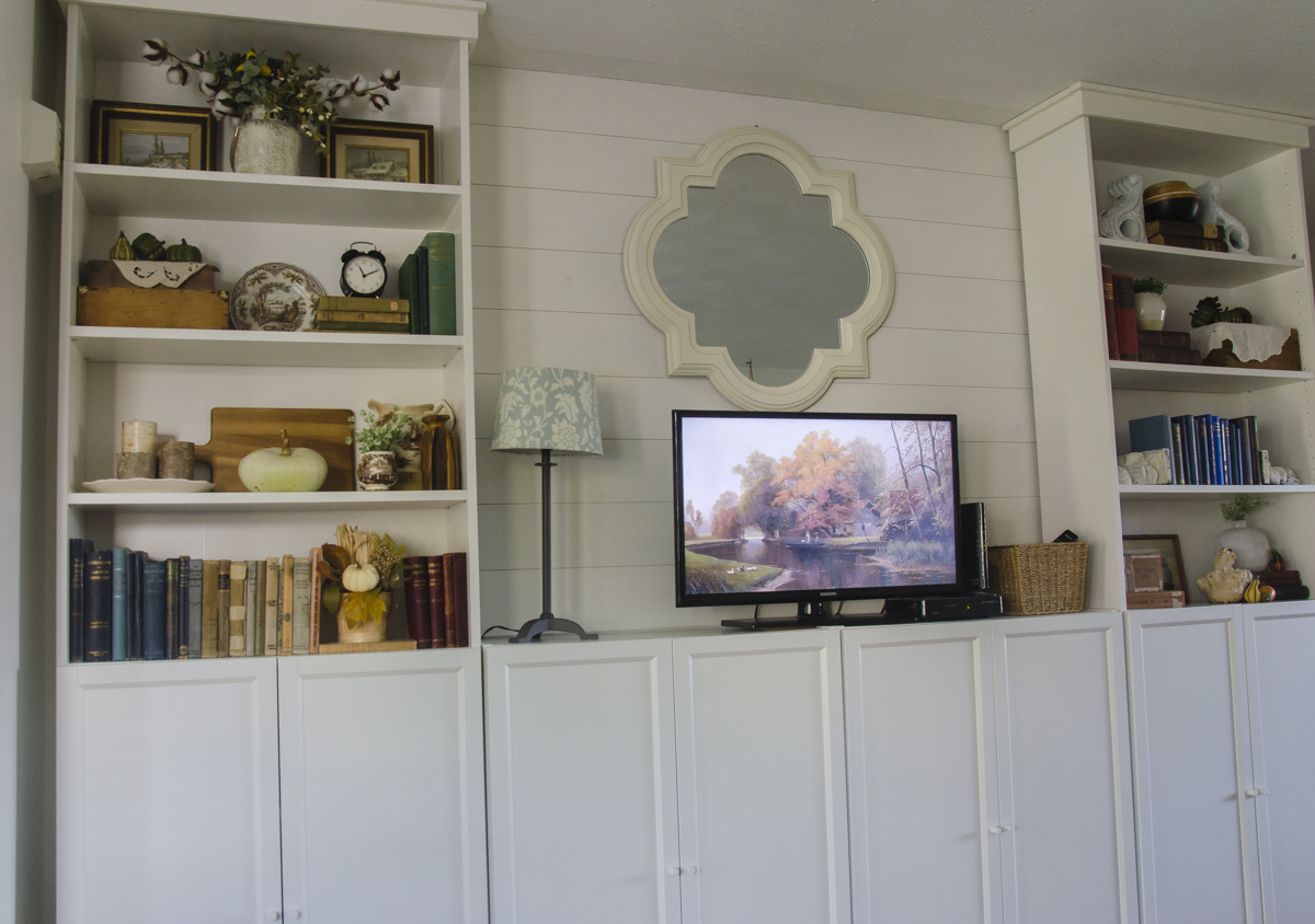 Frame tv art displayed on a small tv in a living room