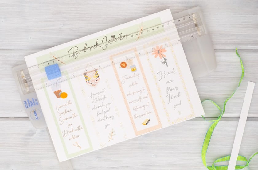 Set of 4 bookmark printable for Summer, friends, and adult ladies being cut apart by a paper cutter.