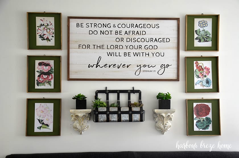 close up of printable flower images hung above a couch