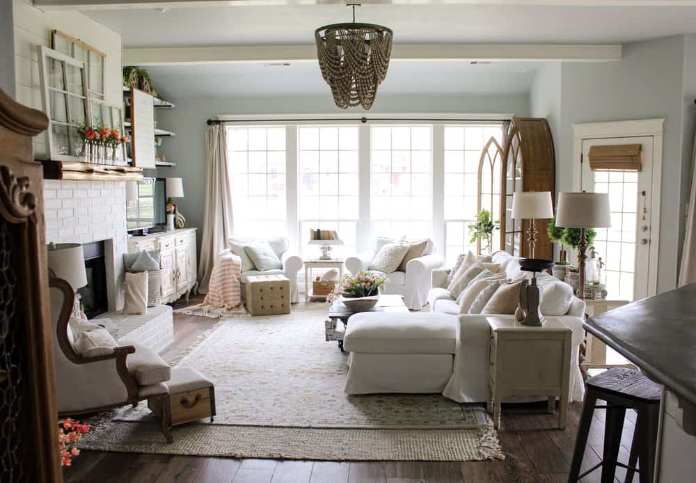 modern farmhouse style living room with white furniture and wood accents