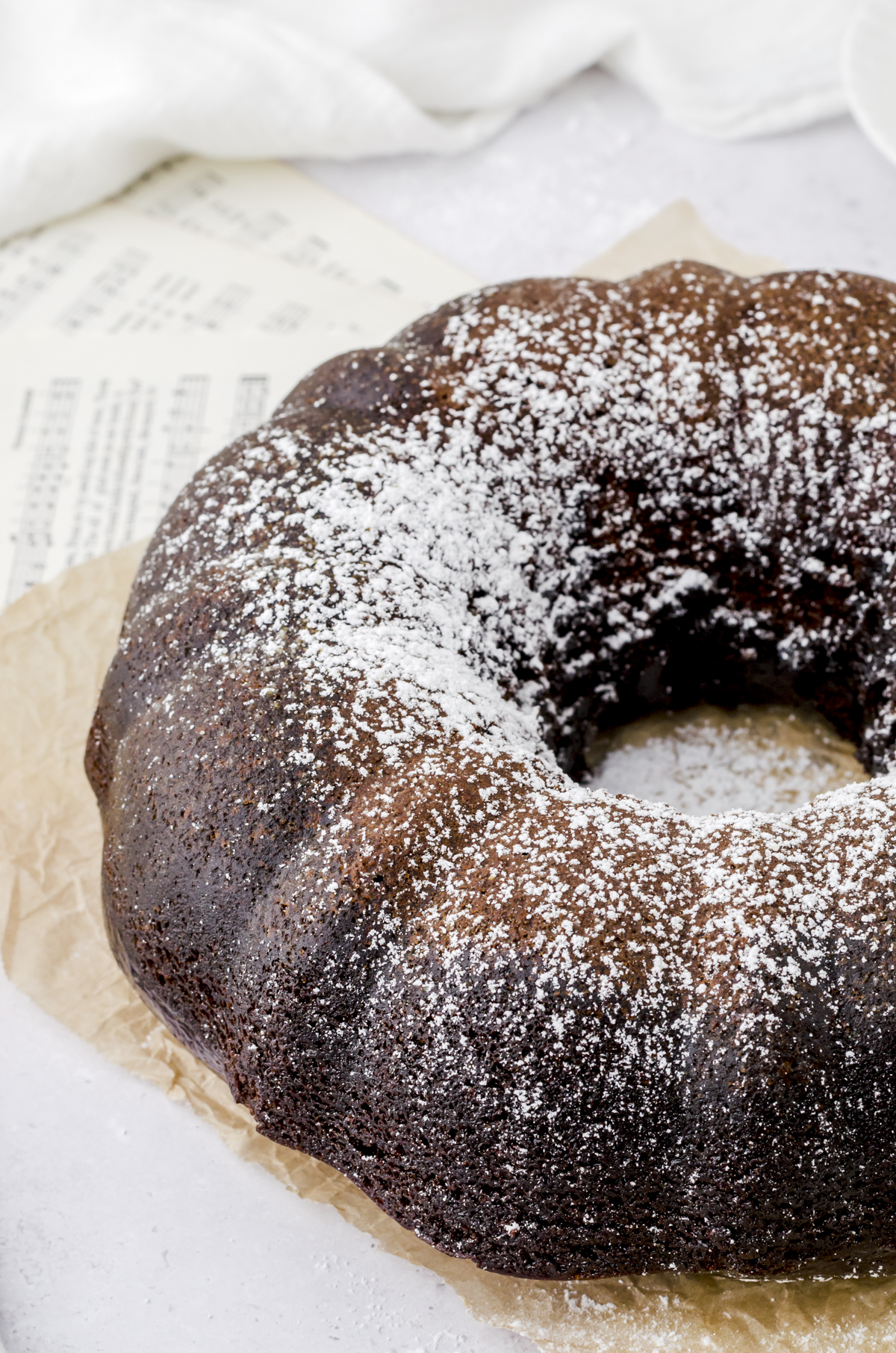 Gingerbread cake with a dusting of powdered sugar on the top.