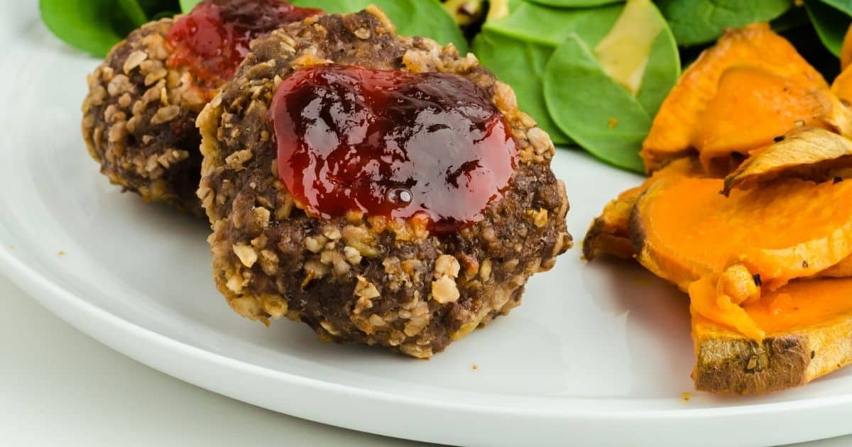 oven baked hamburger steak with barbecue sauce on it