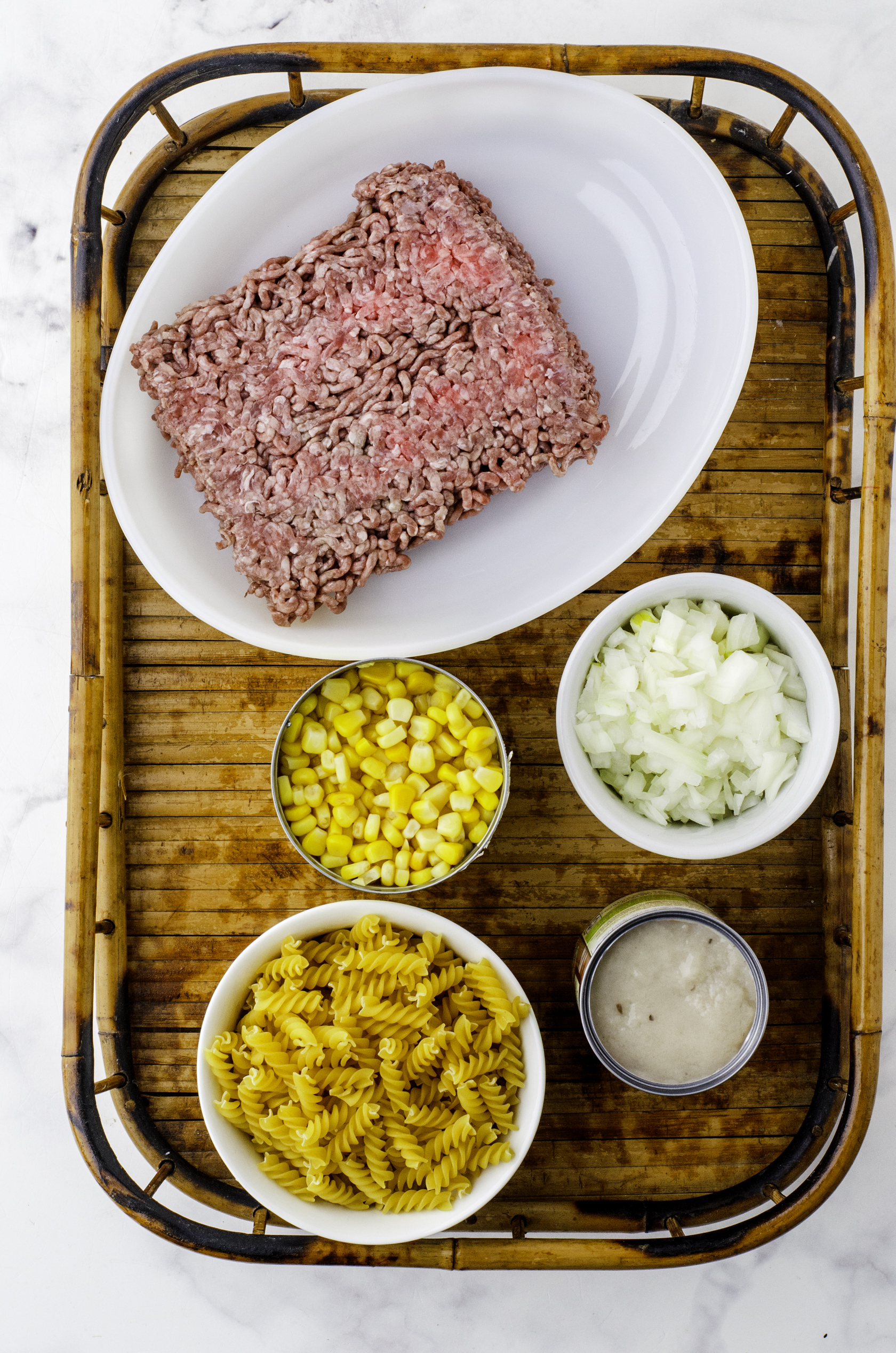 Ingredients needed for homemade hamburger helper stroganaff with mushroom soup and corn recipe.