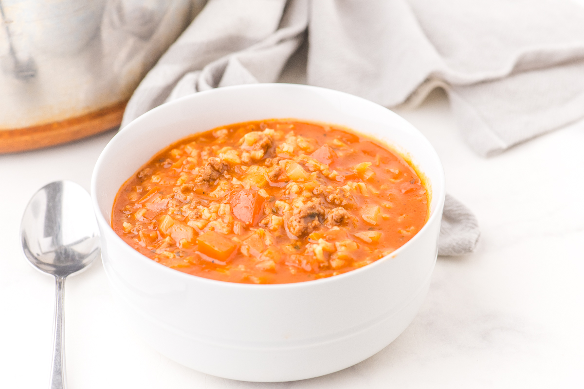A bowl of hearty hamburger rice soup.