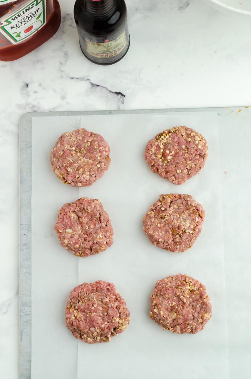 Hamburger steaks ready to put in the freezer for these make ahead baked hamburger steaks recipe.
