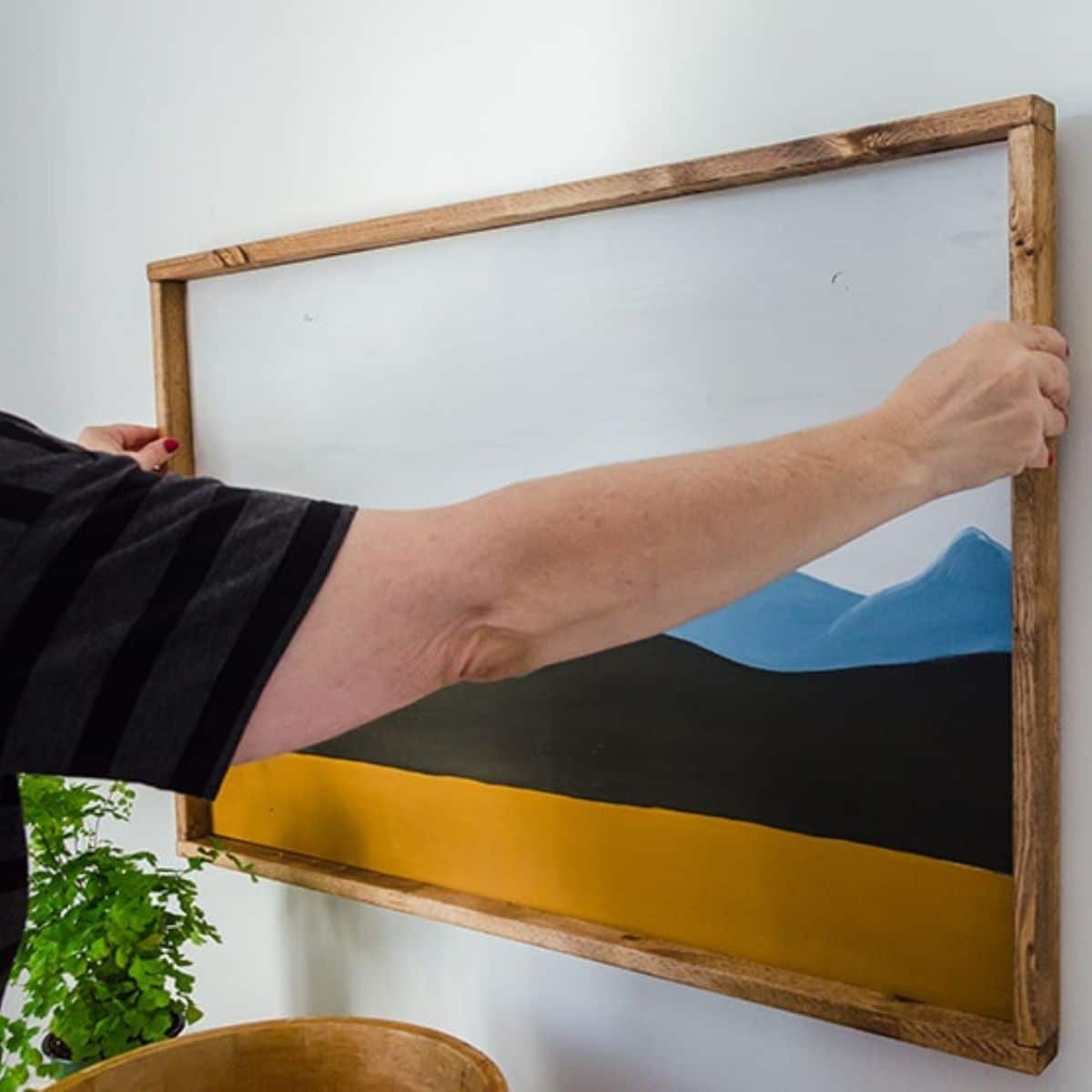 Simple Way to Hang Art on Drywall with Two Hooks