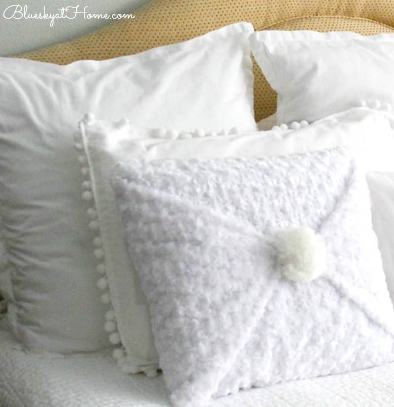 homestyle gathering 3 white pillows on a bed