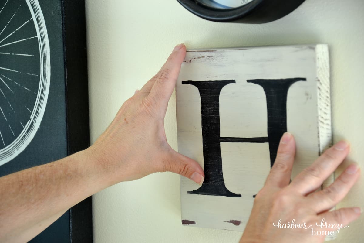 hanging a frame on the wall