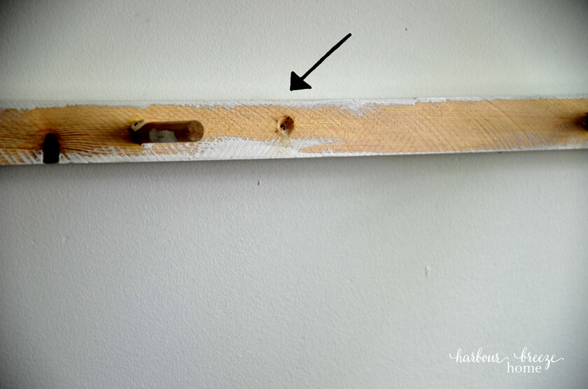 pilot holes drilled in a floating shelf
