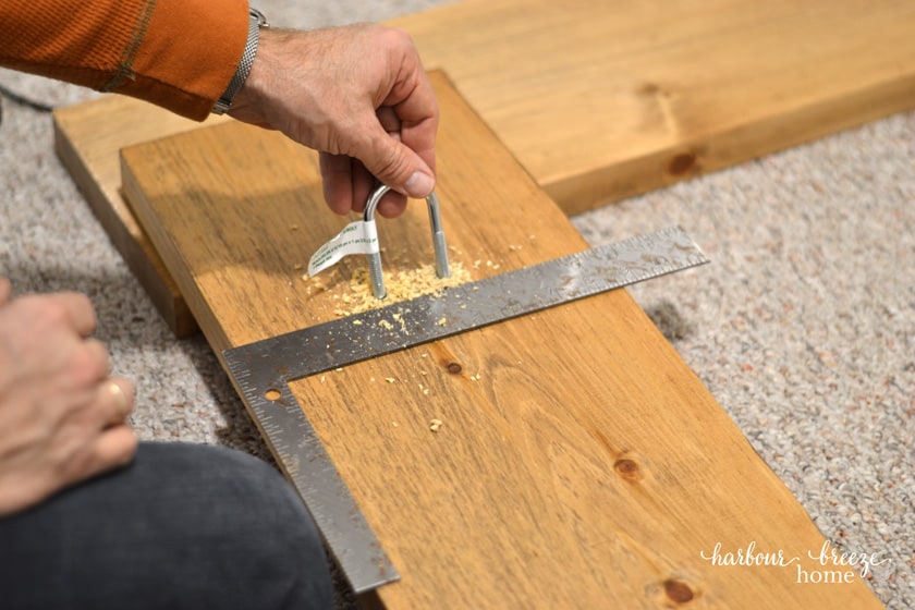 Holes drilled in a shelf for turnbuckle hardware