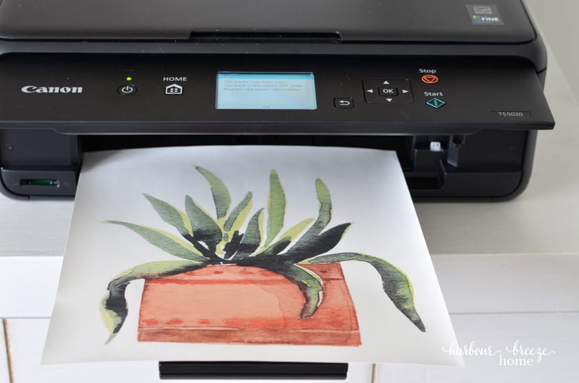 a graphic printed on Avery iron on transfer paper coming out of a Canon pixma printer
