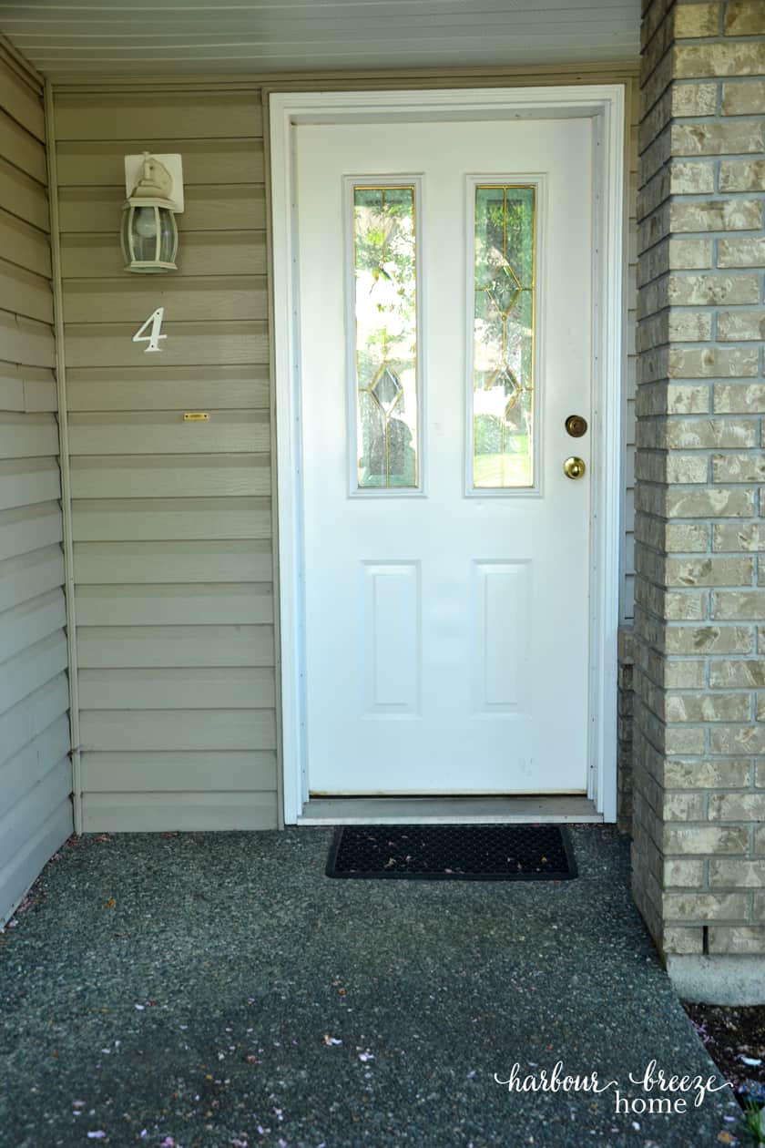 white front door with no decor