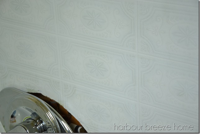 Fake tile board after 1st coat of paint