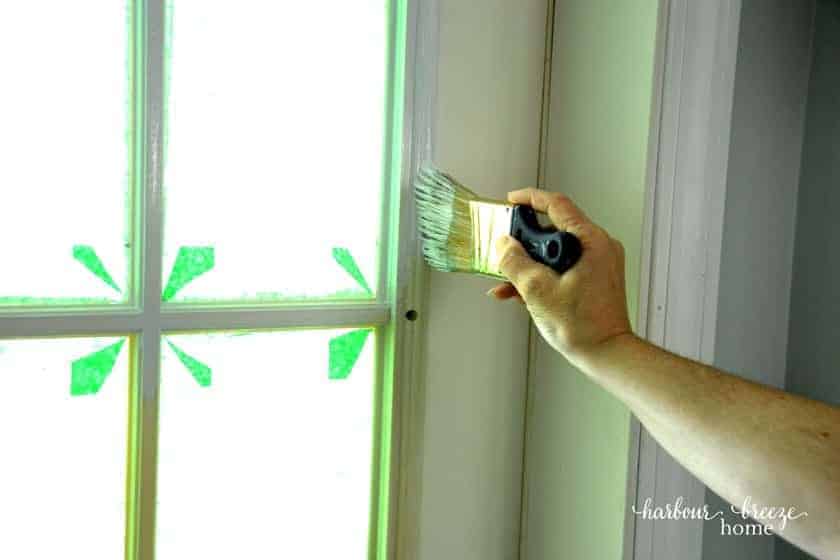 Prime plastic door trim with a handle less trim paint brush first.
