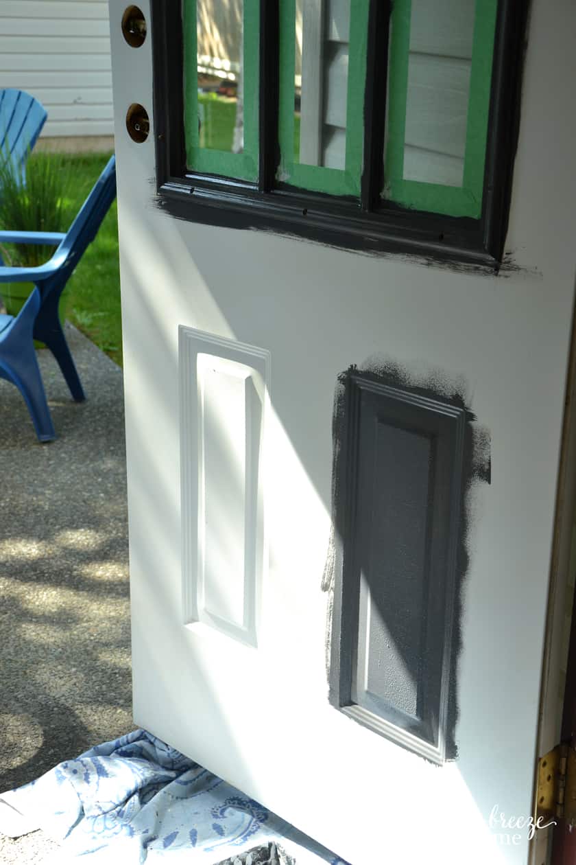 Paint the inside portion of the recessed area with a foam roller. The color used on this door is Raccoon Fur by Benjamin Moore