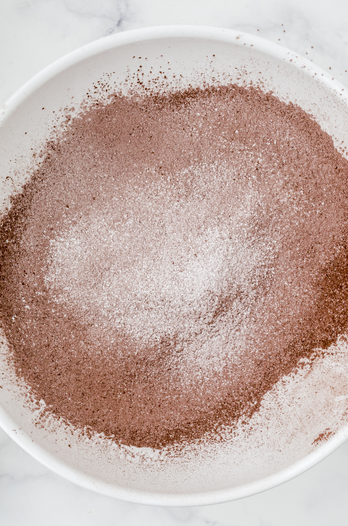 Sifted flour and dry ingredients in a large bowl.