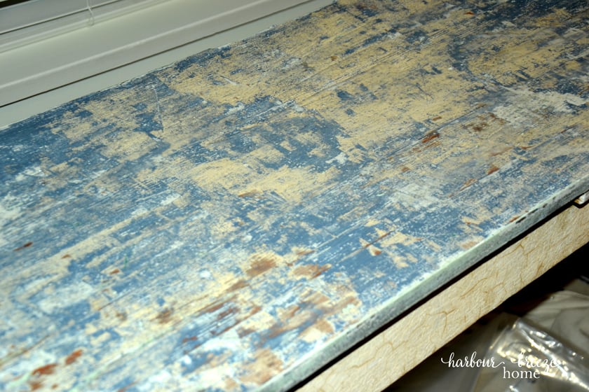 Picture of a table top with layers of paint