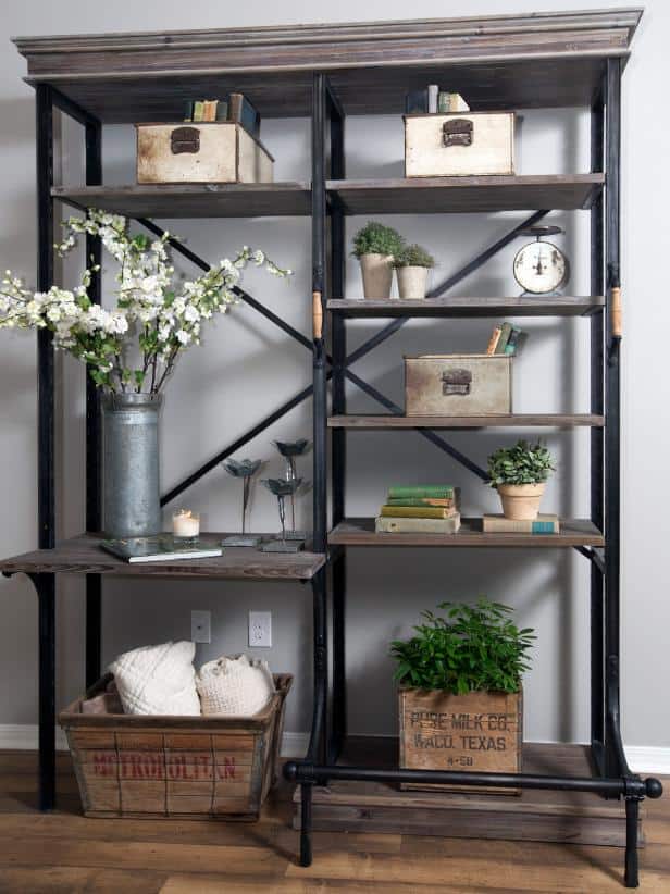 A farmhouse bookshelf that is styled with farmhouse bookshelf decor