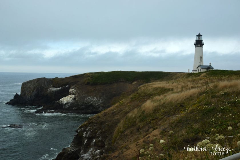 Lighthouse standing on a rocky cliff ~ Yaquina Head Lighthouse