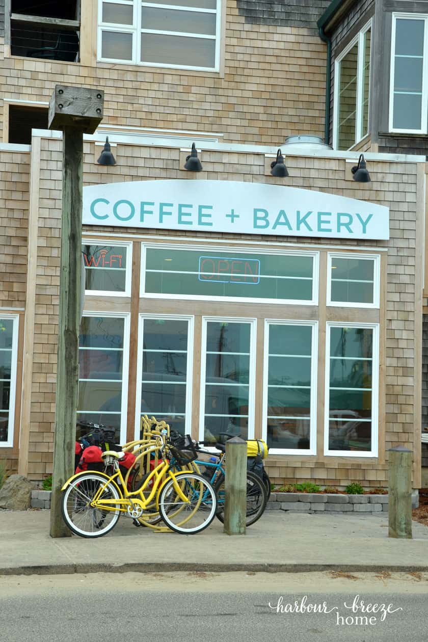 coffee shop with bikes parked in the front