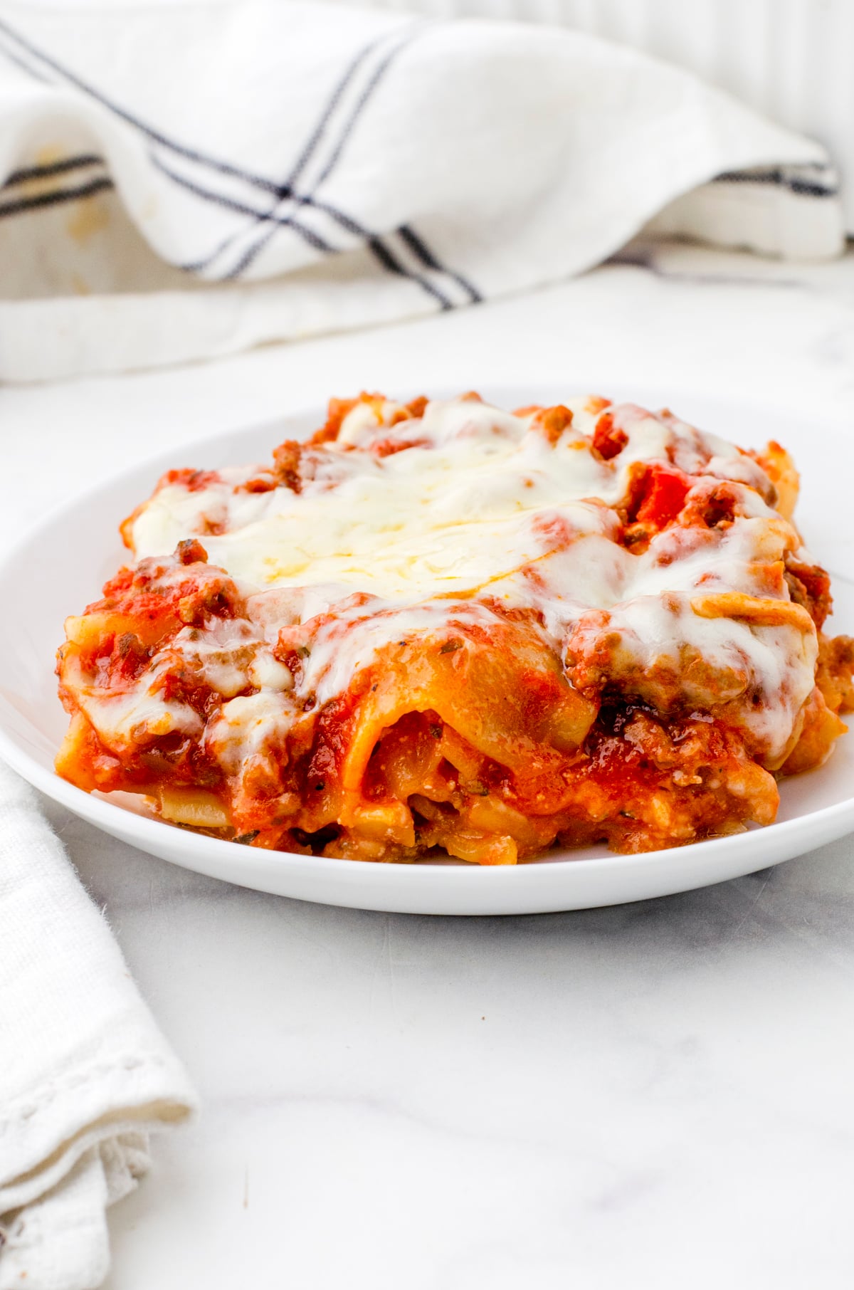 Baked make ahead lasagna on a dinner plate.