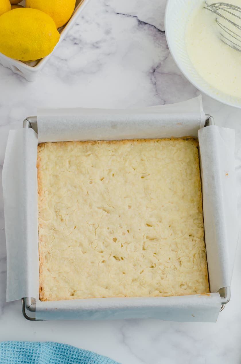 The shortbread crust for lemon squares after it has been baked.