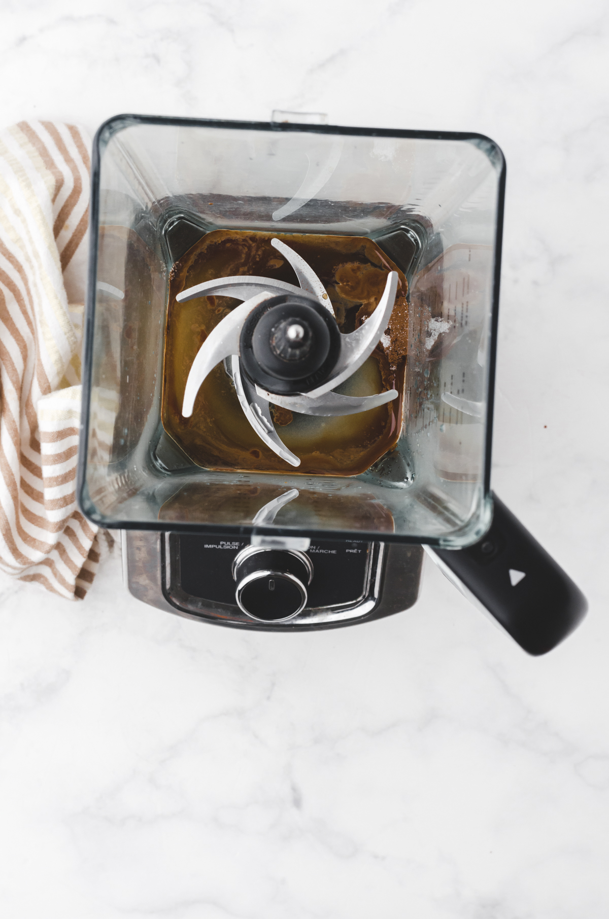 boiling water and espresso powder in a blender