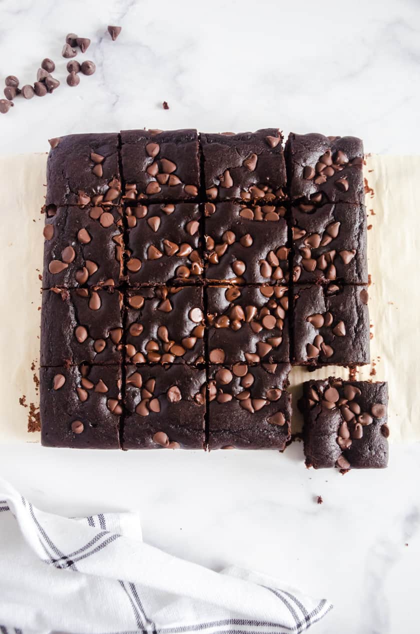 Baked black bean brownies removed from the pan and sliced.